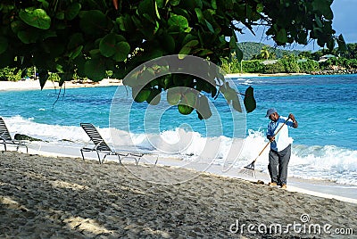 Local Worker on Beach Editorial Stock Photo