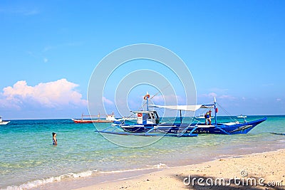 Locals getting ready for a busy day of diving Editorial Stock Photo