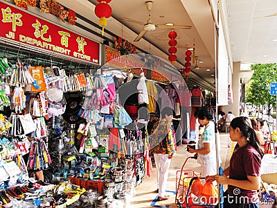 Locals in Singapore buying provisions Editorial Stock Photo