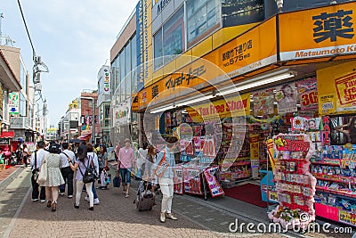 Locals and tourists walking at Tokyo's Harajuku's Takeshita street Editorial Stock Photo