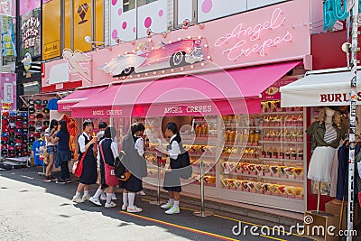 Locals and tourists walking at Tokyo's Harajuku's Takeshita street Editorial Stock Photo