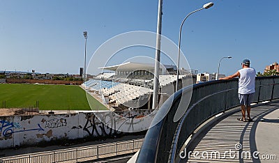 Locals watch the remodelation of the Balearic soccer stadium in Mallorca Editorial Stock Photo