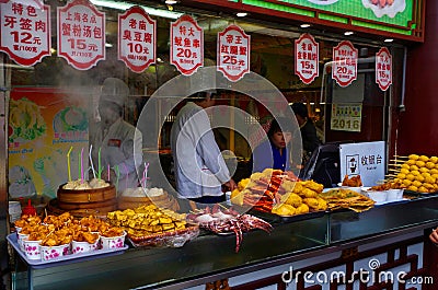 Located in the Chinese cultural area of the food stall, selling snacks such as soup dumplings, squid skewers, stinky tofu Editorial Stock Photo