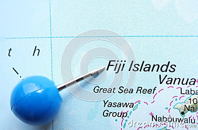 Location Fiji Islands, Blue clerical needle on map. Close up of Fiji Islands map marked with a blue pushpin. Stock Photo