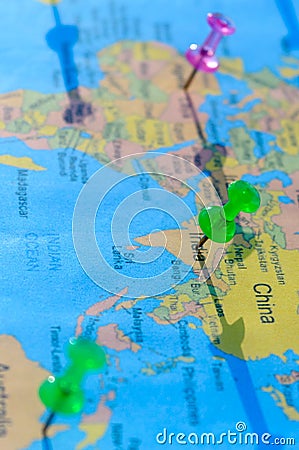 Location Pin on India on a World Map. Global Mapping. Close up. Vertical. Table top view. Selective focus. Shallow depth of field Stock Photo