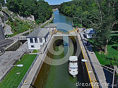 Lock gate with boat on the Erie Canal Stock Photo