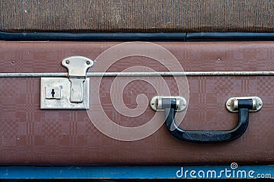 Lock and handle on old suitcase. Close up. Stock Photo