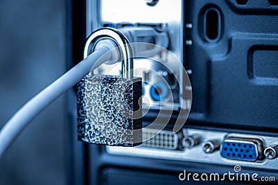 Lock hanging on a network cable Stock Photo