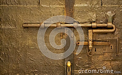 Lock on one of the main doors with bronze detail from St. Peter's Basilica in Rome, Italy Stock Photo