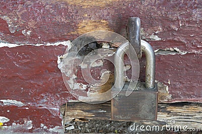 Lock paddlock tight wood wooden old antique rustic concept Stock Photo