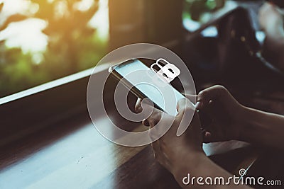 Lock sign security system icon screen on smartphone show feel safe in social network Stock Photo