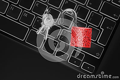 Locked computer safe from virus or malware attack. Laptop computer being protected from online cyber crime and hacking. Computer Stock Photo