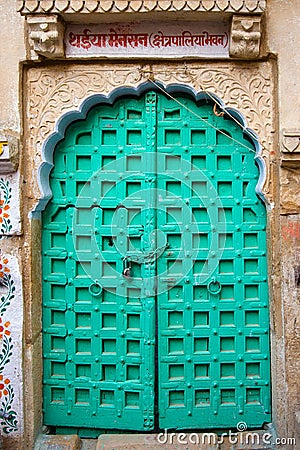 Locked green door Stock Photo