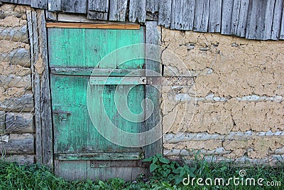 Locked green door in a country house Stock Photo