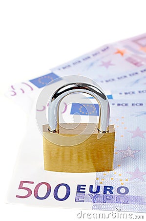 Locked padlock and money Stock Photo