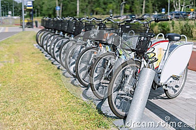 Locked rental bikes stand in a row Stock Photo