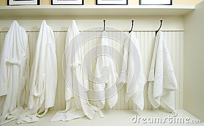 Locker room with bathrobes towels Stock Photo