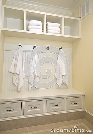 Locker room with bathrobes towels Stock Photo