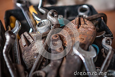 Locking pliers and wrench in tool box Stock Photo