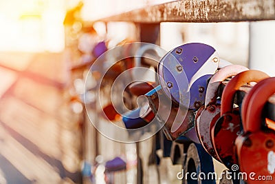 Locks on the bridge. Symbol of lovers, wedding tradition Stock Photo