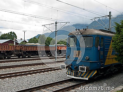 Electric locomotive stop in Busteni train station Stock Photo