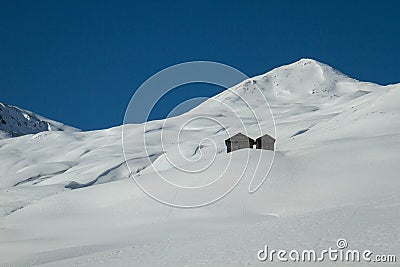 Lodges in snowy landscape Stock Photo