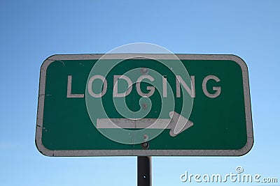 Lodging sign with arrow Stock Photo