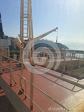 Loding bulk carrier ship onboard seamen Stock Photo