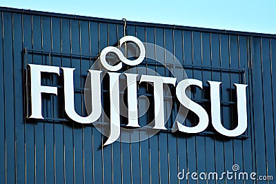 Sign Fujitsu. Company signboard Fujitsu. Editorial Stock Photo