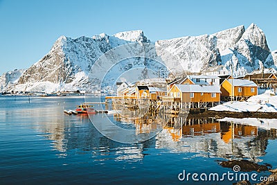 Lofoten winter scenery with traditional fisherman Rorbuer cabins, Sakrisoy, village of Reine, Norway Stock Photo