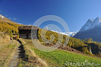 Log cabin in the mountains Stock Photo