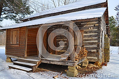 Log cabin in snow Stock Photo