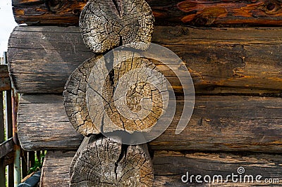 Log masonry. Corner of the log cabin made of logs. Old texture on old logs Stock Photo