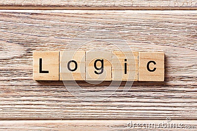 Logic word written on wood block. Logic text on table, concept Stock Photo