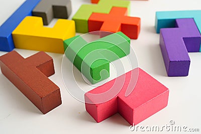 Logical thinking and problem solving problem solution creative business, wooden puzzle geometric block shape Stock Photo