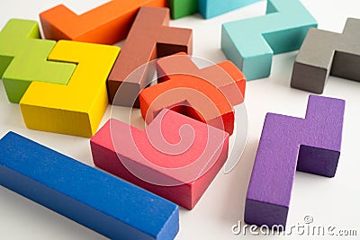 Logical thinking and problem solving problem solution creative business, wooden puzzle geometric block shape Stock Photo