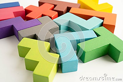 Logical thinking and problem solving problem solution creative business, wooden puzzle geometric block shape Stock Photo