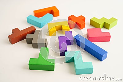 Logical thinking and problem solving problem solution creative business, wooden puzzle geometric block shape Stock Photo