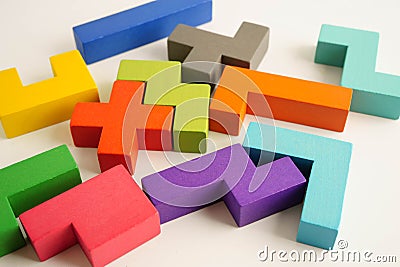 Logical thinking and problem solving problem solution creative business, wooden puzzle geometric block shape Stock Photo