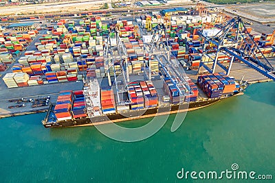 Logistic container shipping boat at shipping yard Stock Photo