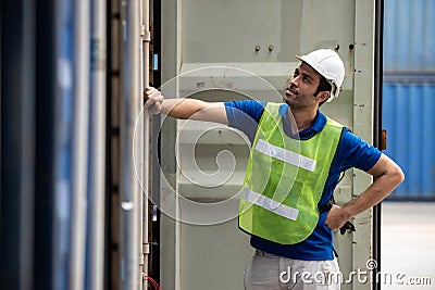 Logistic worker man wearing worker uniform found out making mistakes at work Stock Photo