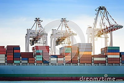 Logistics import export background of Container Cargo ship in seaport on blue sky, Freight Transportation Stock Photo
