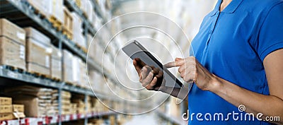 logistics service, warehouse management and inventory concept - female worker using digital tablet in warehouse Stock Photo