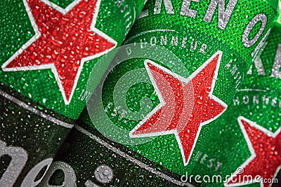 logo on aluminum cans of Heineken beer. Heineken Dutch brewing company Editorial Stock Photo