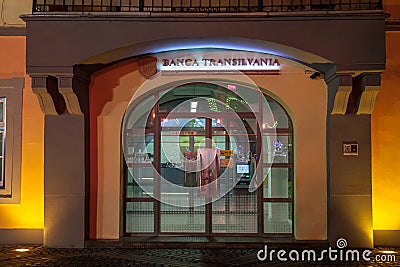 Logo of Banca Transilvania Bank of Transylvania at night on a Sibiu office of the company. BT is considered to be a leading bank Editorial Stock Photo