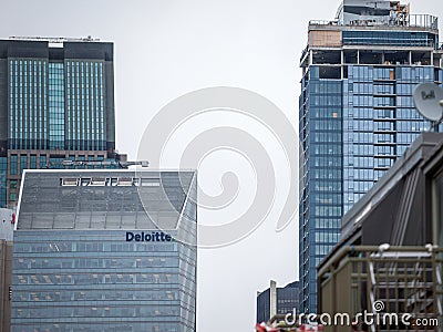 Logo of Deloitte on their main office building in Montreal, Quebec. Editorial Stock Photo