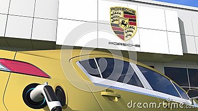 Charging electric car plug and PORSCHE logo. Editorial conceptual 3d 3d rendering Editorial Stock Photo