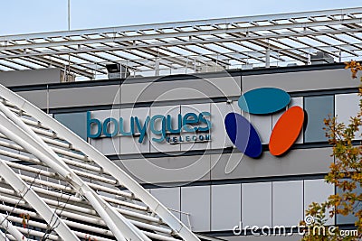 Logo on the facade of the technopole building of Bouygues Telecom, VÃ©lizy-Villacoublay, France Editorial Stock Photo