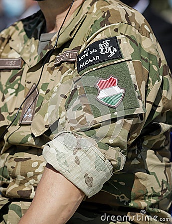 Logo of the Hungarian Hussars on the uniform of an officer Editorial Stock Photo
