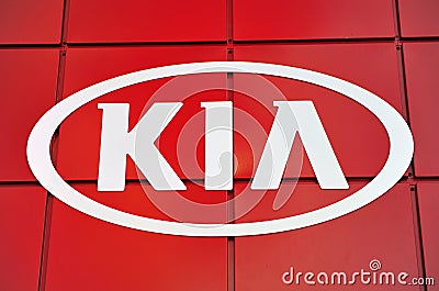 Logo of Kia motor company on red background Editorial Stock Photo